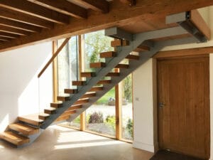 Floating Stairs with Oak Sleeper Treads and Glass Balustrade