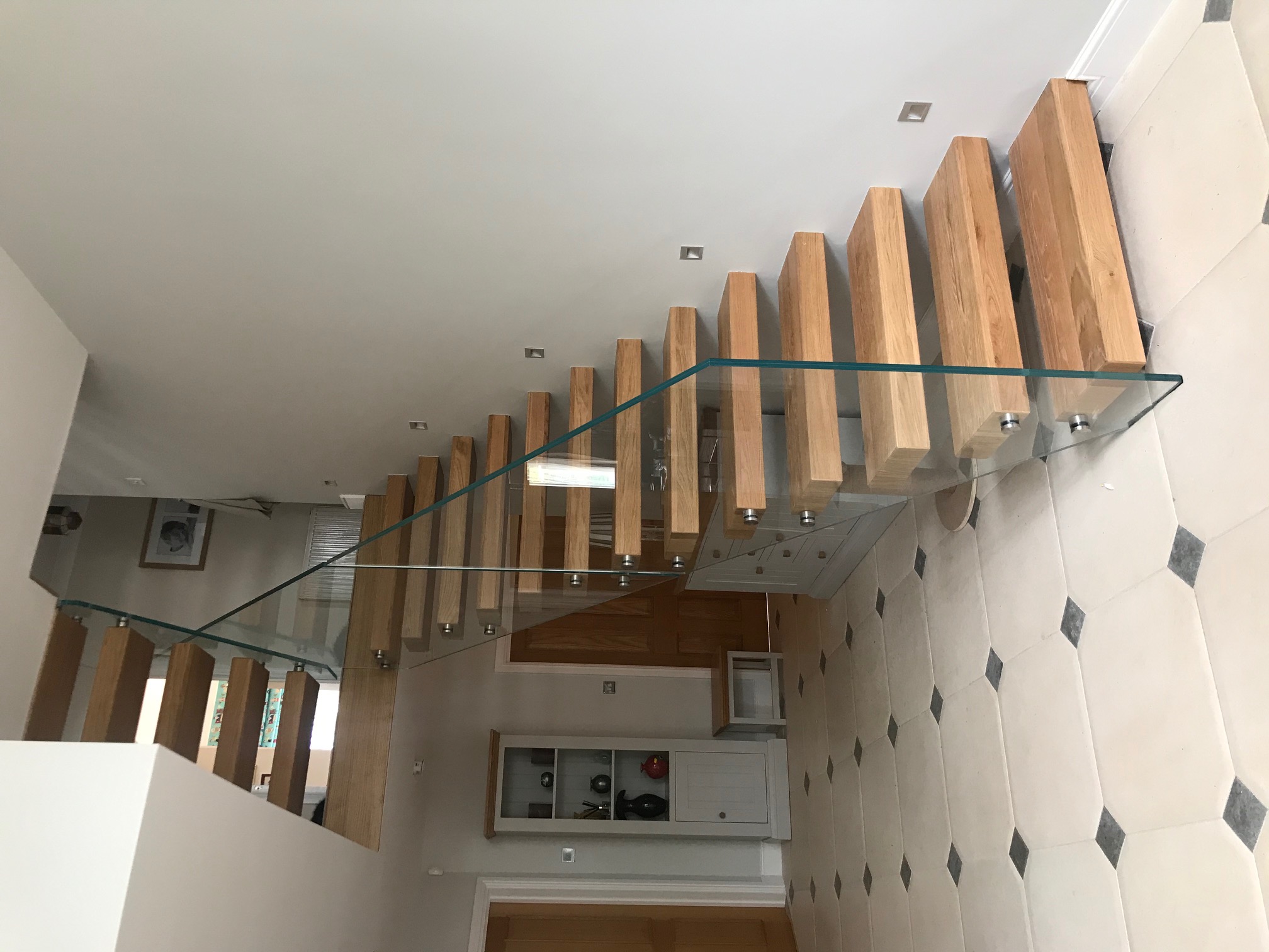 floating stairs with natural oak treads